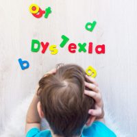 Child with dyslexia organizing letters Child with dyslexia organizing letters