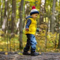 Child balancing on a log Child balancing on a log